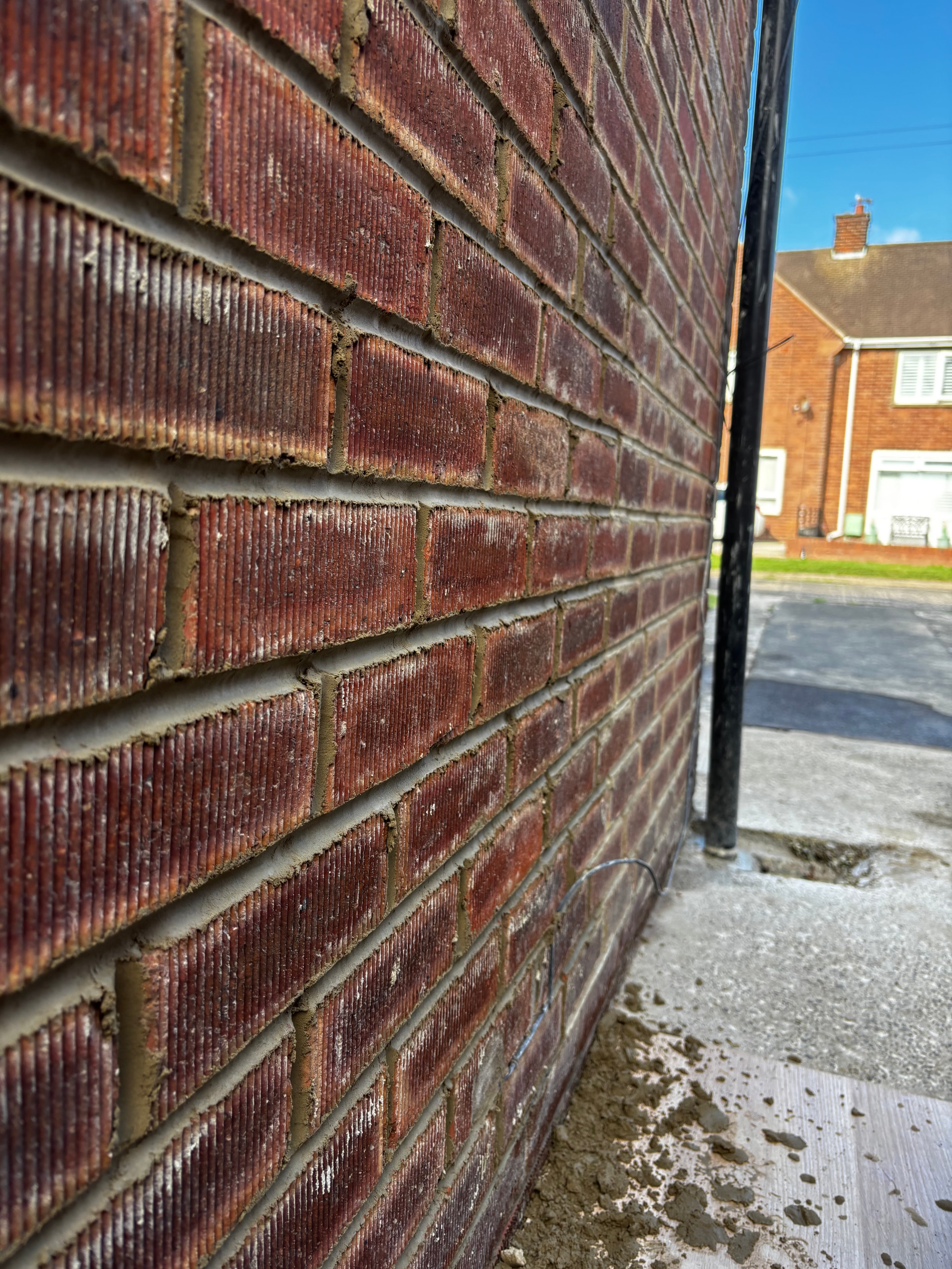 Mason repointing brickwork
